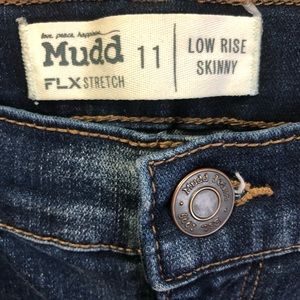 Mid-rise ripped skinny jeans